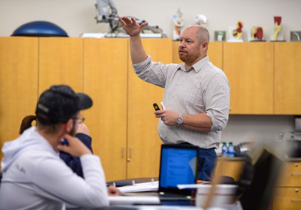 Brad Bechard lecturing in a PTA class.