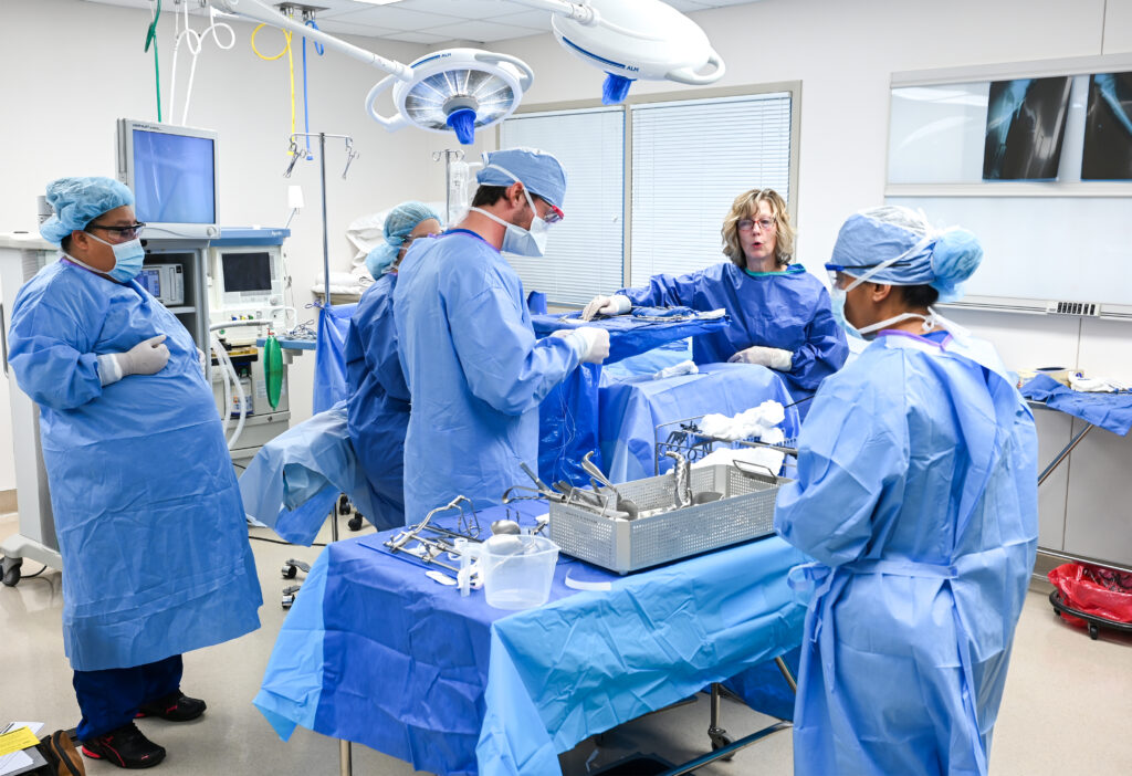 Photo of surgeons performing surgery.